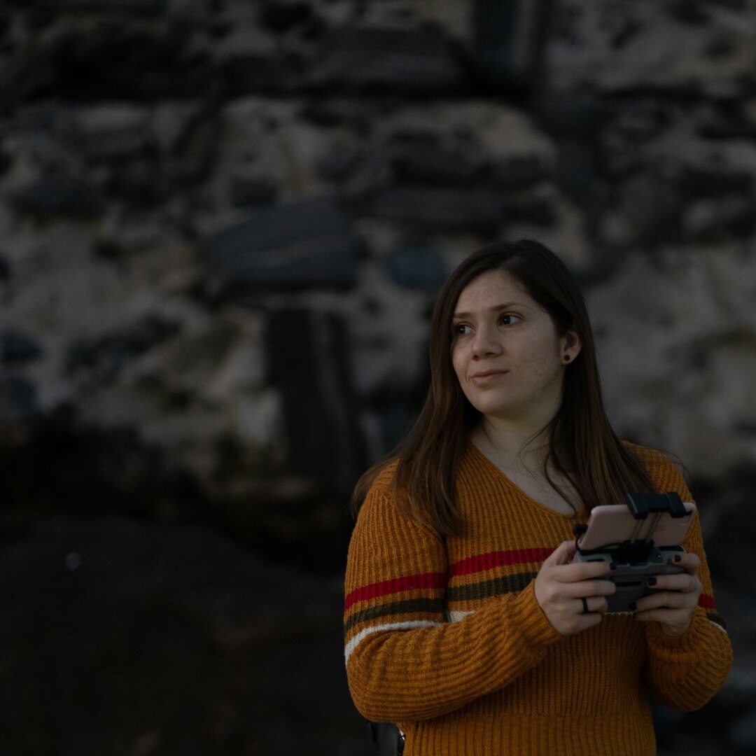 Portrait of a young European woman assistant camera operator